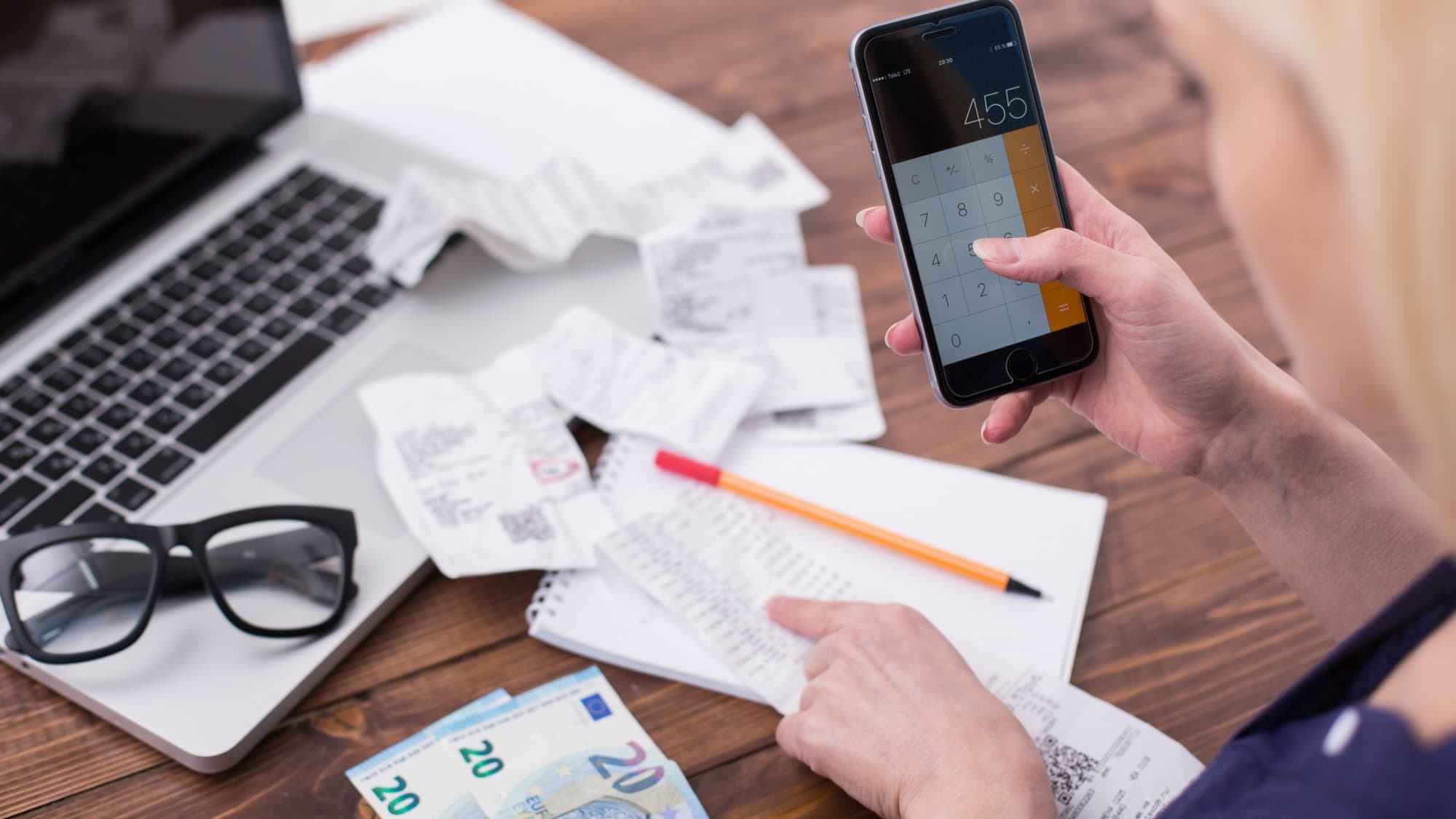 Calculating expenses at home workplace with mobile.