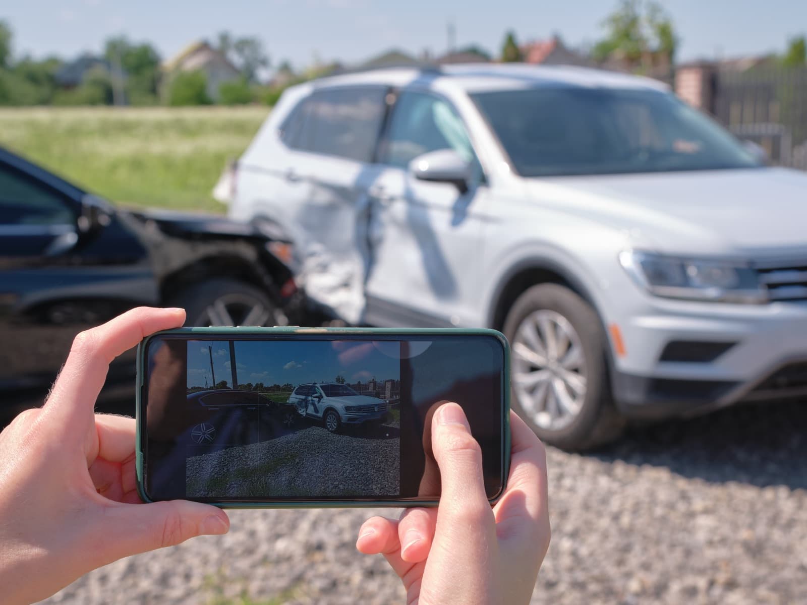 Photographing car crash with smartphone for insura.